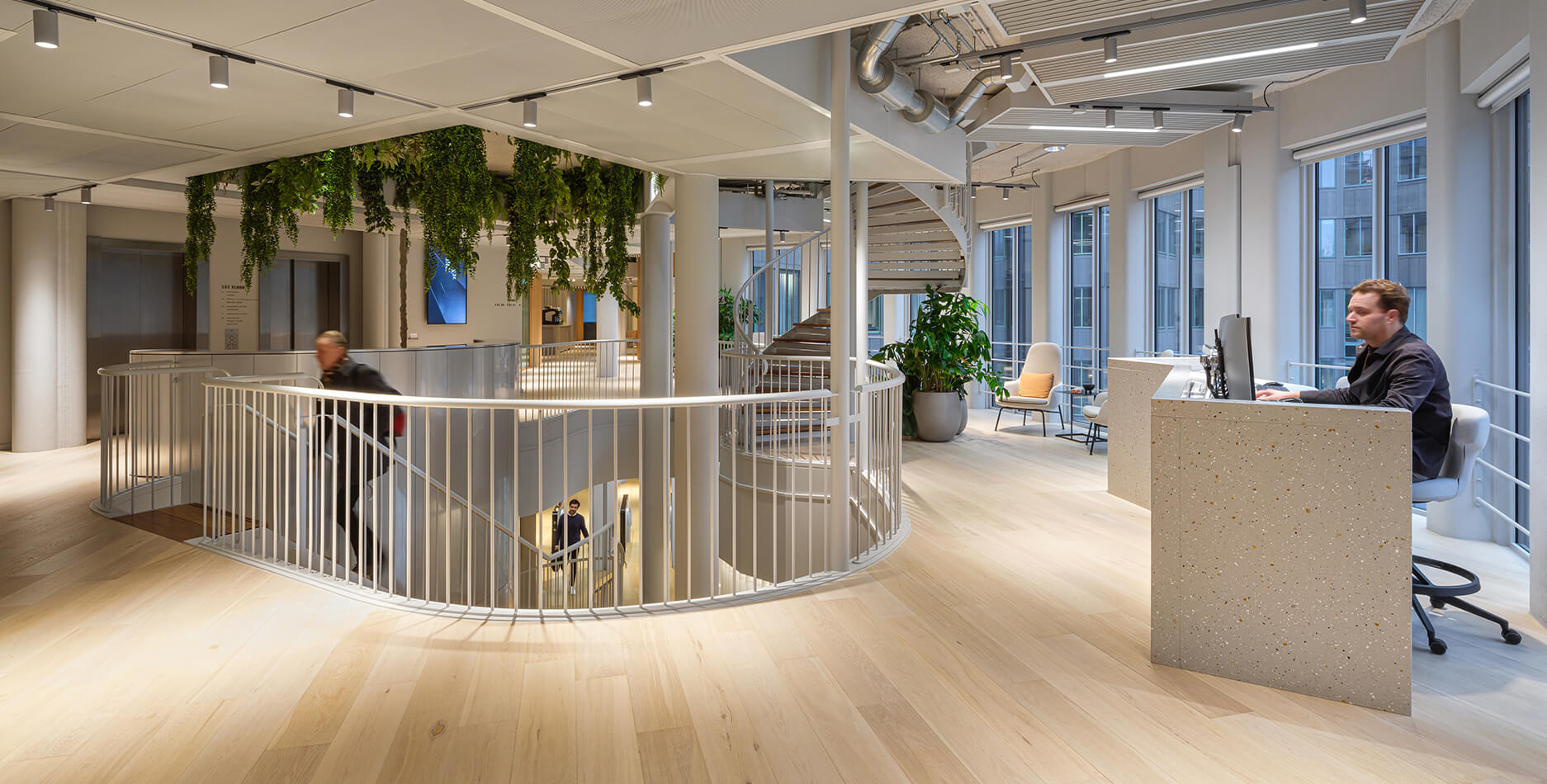 Apto Architects’ workplace concept for the 18,000 m² Tripolis office in Amsterdam, featuring sustainable office design, collaborative workspaces, and efficient circulation.