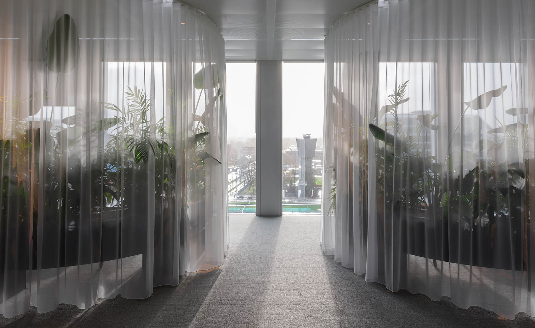 Apto Architects’ workplace concept for the 18,000 m² Tripolis office in Amsterdam, featuring sustainable office design, collaborative workspaces, and efficient circulation.