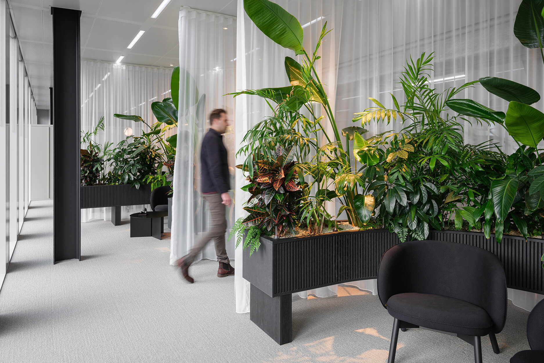 Apto Architects’ workplace concept for the 18,000 m² Tripolis office in Amsterdam, featuring sustainable office design, collaborative workspaces, and efficient circulation.